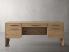 a wooden desk with three drawers on one side and an open drawer on the other