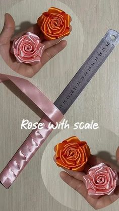 two roses are being held in the palm of someone's hand with a ruler