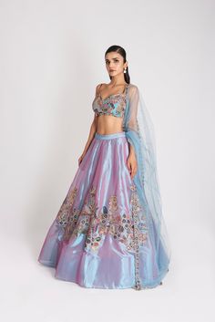 Kinfolk Wisteria blue applique embellished tissue MK lehenga, blouse & tulle dupatta. From Aisha Rao's Kinfolk collection. DELIVERY TIMEPlease allow 6-8 weeks for your outfit to arrive. FABRIC DETAILSTissue Professional cleaning only. Fusion Style Festive Silk Lehenga, Blue Tissue Silk Saree Set, Designer Blue Tissue Silk Anarkali Set, Festive Fusion Silk Sets, Designer Fusion Lehenga With Traditional Drape, Festive Fusion Style Silk Sets, Designer Fusion Choli With Dupatta, Fitted Blue Tissue Silk Choli, Festive Fusion Style Dresses With Dupatta