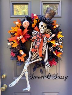 a skeleton wreath on the front door