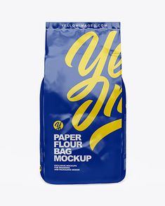 a blue bag with yellow lettering on the front and bottom, that says paper flour bag mockup