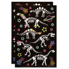 the glow in the dark sticker sheet is decorated with skeletons, stars and planets