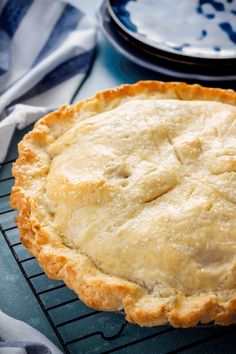 a pie sitting on top of a cooling rack