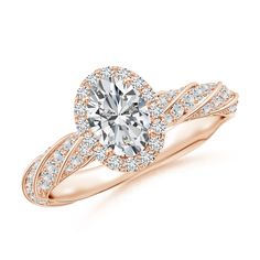 a rose gold engagement ring with an oval center surrounded by round brilliant cut diamond accents