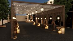 an outdoor area with lights and lanterns