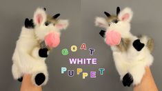 two stuffed animals with their mouths open and the words goat white puppet written in multicolored letters