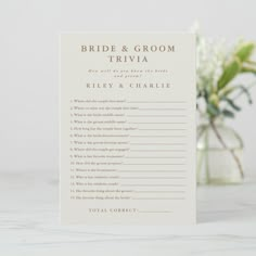 a white card with the words bride and groom trivia on it