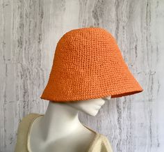 Crochet raffia hat It is a classic accessory for every woman for sun protection, summer parties, beach and travel. Can be a good gift for a woman of any age. The cap is crocheted from natural raffia, light, elastic, the brim of the cap is reinforced with wire. The hat keeps its shape well and does not fade in the sun. The cap is soft to the touch, slightly rough. It is fully crocheted. Easy to carry with foldable design. The hat is perfect for summer wardrobe. Color: Orange Field Size: about 3 inches Care of the product:        It is better to dry the hat naturally, without using additional heating sources. When the raffia product dries, it returns to its original shape.        You cannot wash them in the usual way. If it gets dirty, clean it with soapy water and a sponge. The surface is g Crochet Raffia Hat, Raffia Bucket Hat, Orange Field, Raffia Hat, Cute Coasters, Wardrobe Color, Wire Crochet, Cotton Hat, Cute Hats