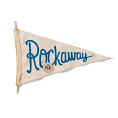 an old pennant with the word rockaway on it and a baseball in blue ink