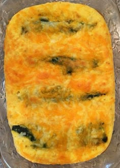 an omelet in a glass dish on a table