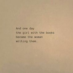 an old typewriter with the words and one day, the girl with the books become the woman writing them