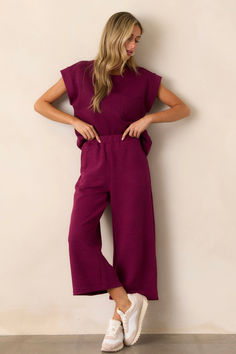 Say hello to your new go-to pants! These Tell Me Dark Sangria Cropped Textured Pants are not only stylish, but also comfortable and versatile. Perfect for making a statement, you'll love the unique texture and playful color (not to mention the flattering cropped length). Get ready to turn heads and make a statement! These sangria purple pants feature a high waisted design, an elastic waistband, functional hip pockets, a textured crisscross design, and a wide leg. Textured Pants, Purple Pants, Purple Top, Sangria, Yule, Short Sleeve Top, Tell Me, Color Splash, Casual Pants