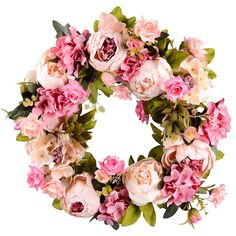 a wreath with pink flowers and green leaves