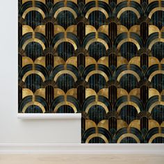 an art deco wallpaper design with gold and black fan shapes on the back side