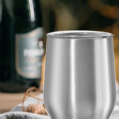 a wine glass sitting on top of a table