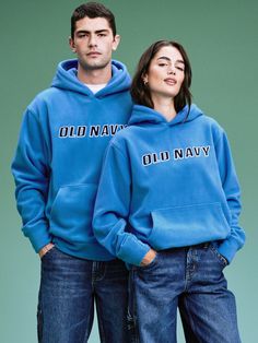 built-in hood long sleeves logo graphic kangaroo pocket pullover style it's the item of the week relaxed fit hits at hip models wear size small (women) and large (men)machine wash according to the care instruction label How To Wear A Hoodie, Navy Logo, Pajamas Gift, Small Women, Family Maternity, Family Pajamas, Blue Hoodie, Big And Tall, 30th Birthday