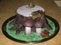 a cake made to look like a mushroom house