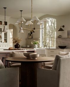 a dining room table with chairs around it