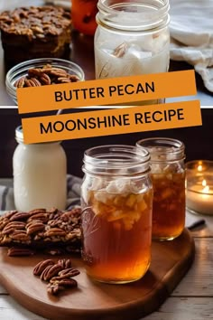 three jars filled with food sitting on top of a wooden cutting board next to candles