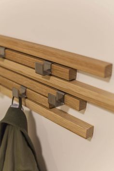 the coat rack is made out of wood