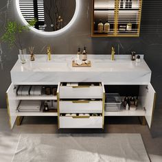 a bathroom vanity with two sinks, mirrors and other items on the countertop in front of a round mirror