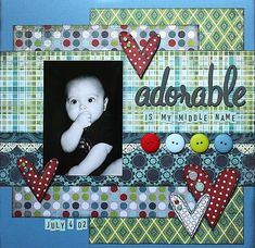 a scrapbook page with an image of a baby