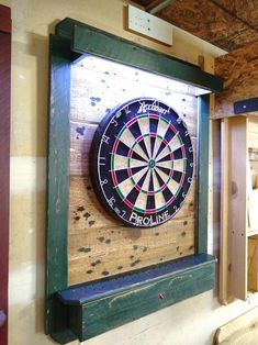 a dart board mounted to the side of a wall