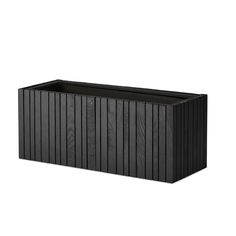 a large black planter with wooden slats on the sides and bottom, in front of a white background