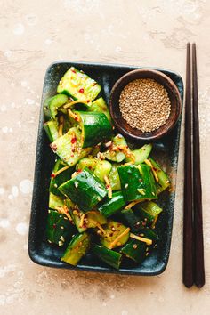 japanese smashed cucumbers with sesame seeds on the side