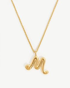 Curly Molten Initial Pendant Necklace - Initial M | 18ct Gold Plated Vermeil. Spell It Out. On a Delicate Trace Chain, this Unique Initial Pendant Necklace Features Your Chosen Letter in a Bespoke Hand-Drawn Font. A Versatile Layering Piece, Keep It for Yourself or Give as the Ultimate Personalized Gift. Metal: 18Ct Gold Plated Vermeil on Recycled Sterling Silver Dimensions: 16 mm X 17. 4mm Chain Length: 500mm with Extensions from 460mm - 500mm Weight: 6. 8g this Piece is Handcrafted with Recycl Double Chain Bracelet, Initial M, Double Chain Necklace, Malachite Necklace, Sterling Silver Initial, Coin Pendant Necklace, Leaf Bracelet, Font A, Initial Pendant Necklace