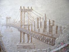 a painting of the brooklyn bridge painted on a wall