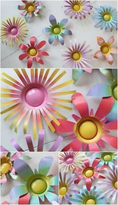 paper flowers are arranged in different colors and sizes, with the center being cut out