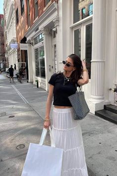 Discover 40+ chic t-shirt outfit ideas for basic, oversized or cropped T-shirts in white, black, or grey, or graphic and colorful T-shirts! From elegant to casual, elevate your style effortlessly for everyday, weekend, work or vacation for spring, summer and beyond.