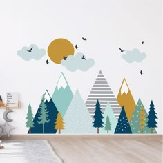 a wall mural with trees and birds in the sky, on top of a wooden floor