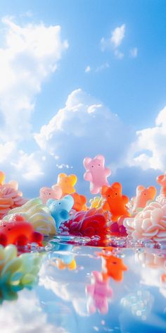 there are many teddy bears floating in the water