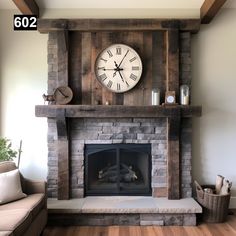 a living room with a fireplace and clock on the mantle