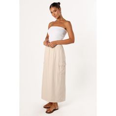 Are you looking for a stylish and timeless piece to add to your wardrobe this season? Look no further than the Picilo Long Midi Skirt! This high waisted midi skirt is designed with an elasticized waistband for comfort and features side pockets adding a playful touch of femininity. Flowy Maxi Skirt With Elastic Waistband For Summer, Chic Gathered Maxi Skirt For Summer, Summer Maxi Skirt With Elastic Waistband For Day Out, Flowy Summer Maxi Skirt For Day Out, Flowy Maxi Skirt For Summer Day Out, Flowy Wide Leg Maxi Skirt For Day Out, Flowy High-waist Maxi Skirt For Summer, Summer Day Out Maxi Skirt With Elastic Waistband, Solid Color Midi Length Bottoms For Summer