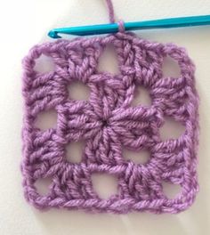 the crochet square is being worked on