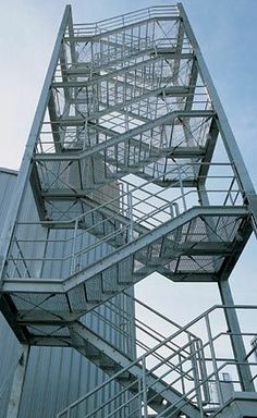 a tall metal structure with lots of stairs