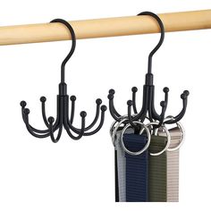 a rack with several rings hanging from it's sides and two hooks on the top