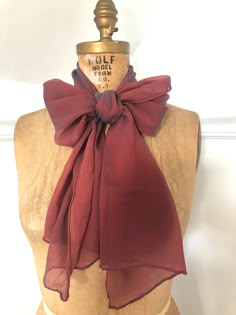 This rectangular sheer scarf is burgundy.  It has a blue iridescent/ombre effect to it. Condition:  Light wear, but in overall good condition with no stains or rips. Fabric:  Synthetic Measurements:  64" x 12" Lana Skye, Fabric Sewing Ideas, Strawberry Dress, History Fashion, Sheer Scarf, Black Peach, Ombre Effect, Chiffon Scarf, Fabric Sewing