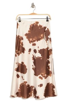 Get ready for your next festival with this trendy cow print midi skirt that features a satin construction. Fixed waist Cowl print Satin construction Midi length Machine wash cold Imported Model stats: 5'10", 32" bust, 25" waist, 36" hip. Model is wearing size S. Cow Print Skirt, Brown Cow Print, Cow Prints, Cow Outfits, Skirt Satin, Spring Palette, Brown Cow, Spring Capsule Wardrobe, Warm Spring