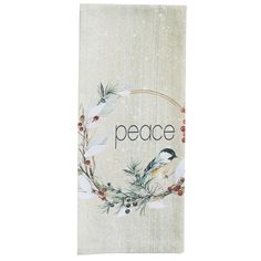 a towel with the word peace written on it and a bird perched on top of a branch