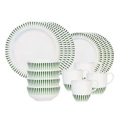 a white and green dinnerware set on a white background