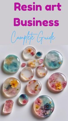 the cover of resin art business complete guide, featuring flowers and bubbles on glass cabs