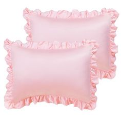 two pink pillows with ruffled edges