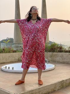 This is our "Timeless" style kaftan. It features a drawstring that you can cinch at the waist. This loose fitting Caftan House dress is exceptionally comfortable and stylish.As for the fabric pattern, we have used a hand drawn and digitally painted technique. So they are all unique designs. It is like wearing wearable art. What I love about digital paintings is that they look as beautiful as the hand paintings but the care needed for them is much less. You can wash them on a gentle cycle and han Casual V-neck Kaftan For Daywear, Beach Dress With Drawstring And Short Sleeves, Short Sleeve Drawstring Beach Dress, Bohemian V-neck Kaftan With Tie Waist, Bohemian Beach Dress With Drawstring, Bohemian Dress With Drawstring, Bohemian V-neck Dress With Drawstring, Bohemian Drawstring Dress For Vacation, V-neck Drawstring Cover-up For Vacation