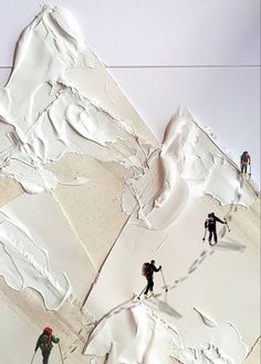 several skiers are skiing down a snowy mountain side with white paint on the walls