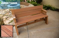 a wooden bench sitting on top of a stone patio