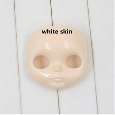 a white mask with the words white skin on it